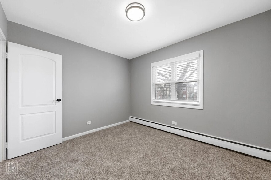 Building Photo - Dryden Homes- 1-21 N Dryden Pl