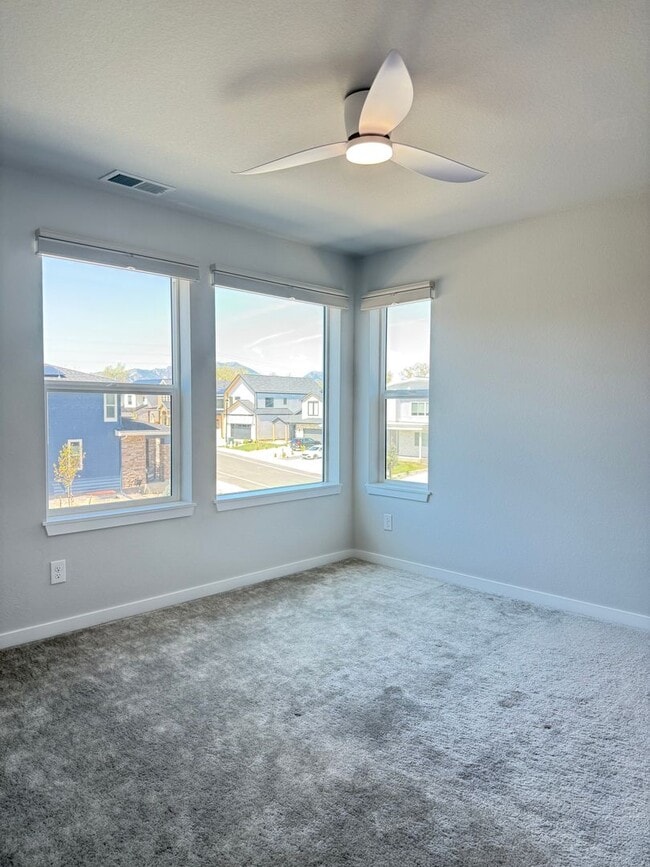 Building Photo - Stunning Luxury Living in Coal Creek with ...