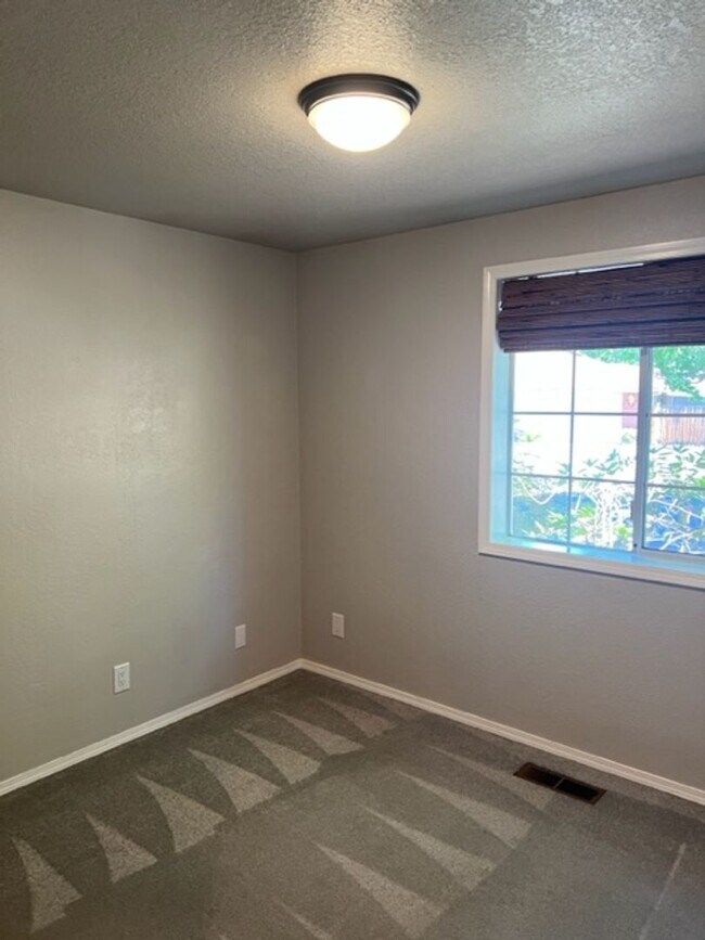 Building Photo - SINGLE LEVEL HOME W/ MANICURED YARD WITH  ...