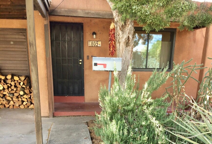 Culinary rosemary bush out the front security door. - 805 Cagua Drive Southeast