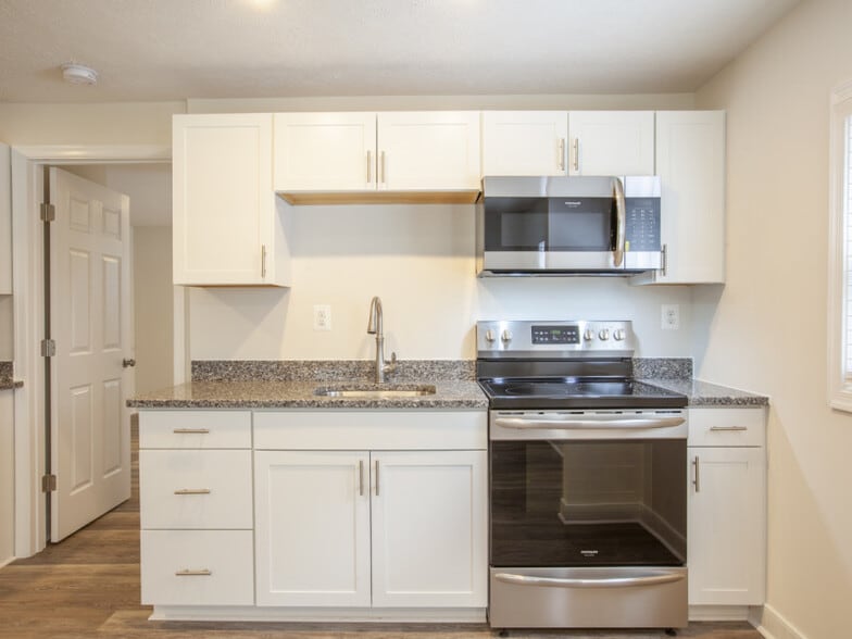 Smooth top range with microwave above - 612 Rock Creek Road