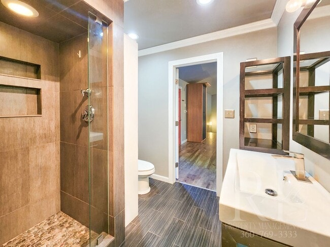 Building Photo - Vaulted Ceilings, Unique Designer Kitchen & Expansive Half-Acre Setting with Flexible Living Spaces