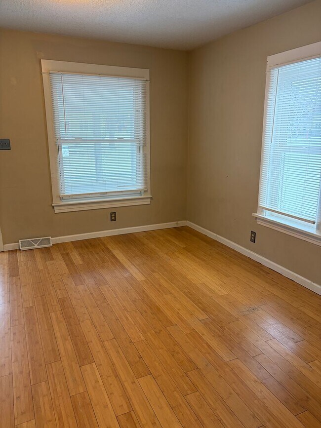 Building Photo - Charming 2-Bedroom, 1.5-Bath with Garage & Fenced Yard