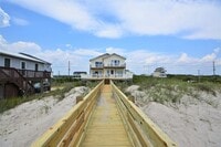 Building Photo - *Pet Friendly* 4 Bedroom Ocean Front Duplex Available January 1st through March 31st 2026- Off Se...