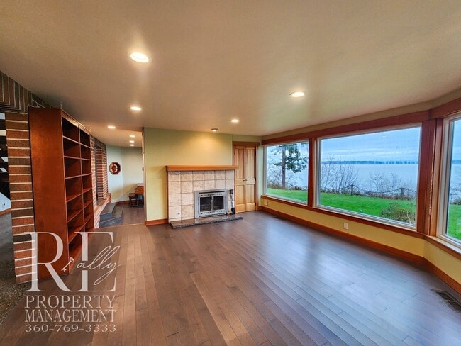 Building Photo - MOVE-IN SPECIAL: 50% OFF FIRST MONTHS RENT - Waterfront Rustic Retreat with Vaulted Ceilings, Pic...