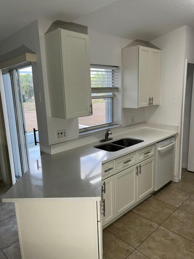 Building Photo - 6480 NW Volucia Dr