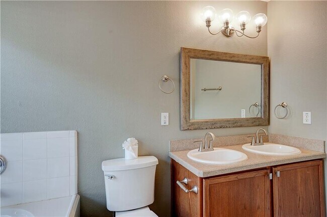 Building Photo - Charming One-Level 4 Bedroom Home with 2-C...