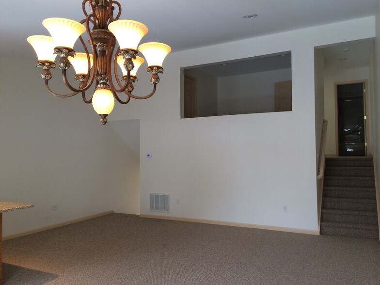 Living Room with Cathedral Ceiling - 67 Tiara Ct