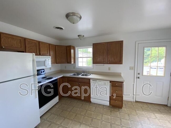 Building Photo - 8065 White Church Rd