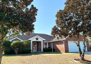 Building Photo - "Charming 4-Bed home in Navarre!"