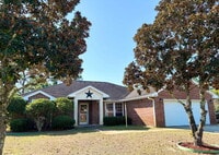 Building Photo - "Charming 4-Bed home in Navarre!"