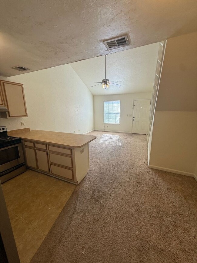 Building Photo - Sun-Filled 2/2 with Stainless Appliances & New Carpet