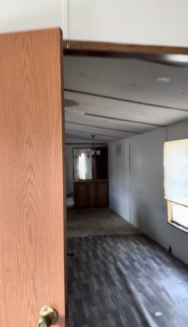 Building Photo - Handyman Special – Land + Home (Rent-to-Own)