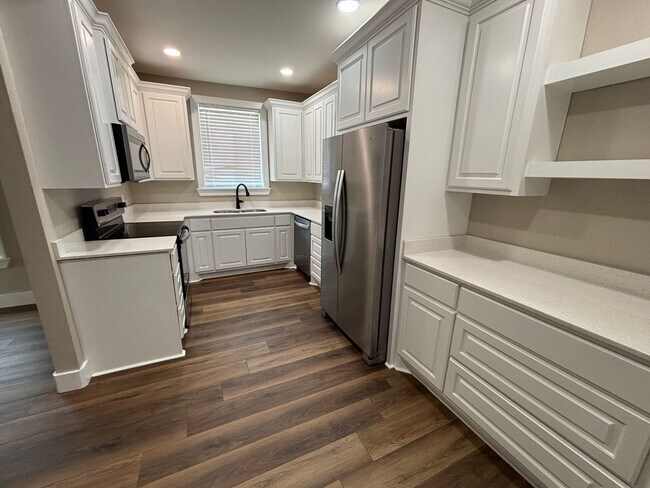 Building Photo - Welcome to this stunning new construction home located in the charming town of Atkins, AR.