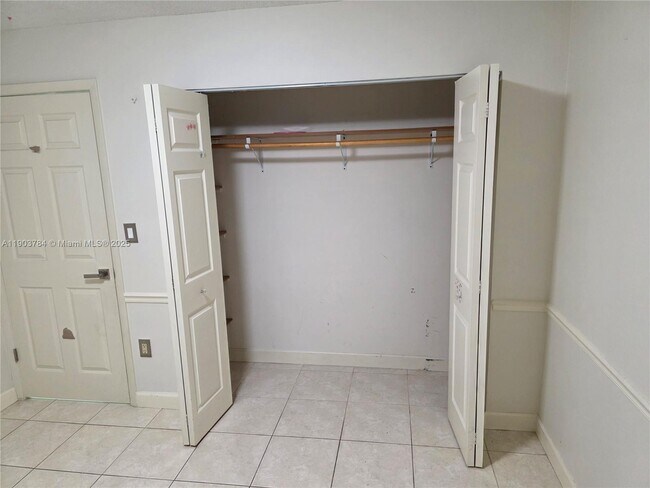 Building Photo - 9917 W Okeechobee Rd