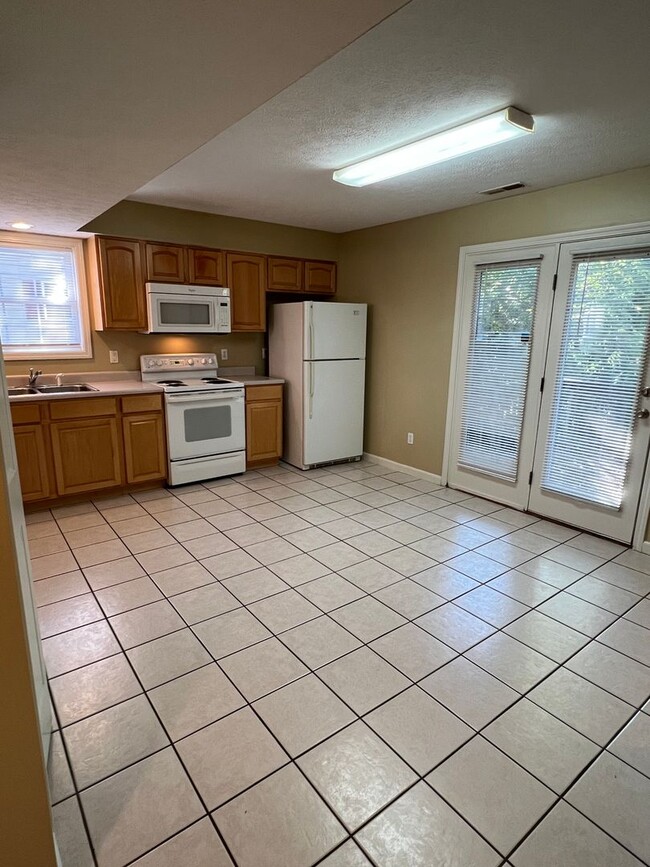 Building Photo - Available July 2026;  Monthly rent $1,750