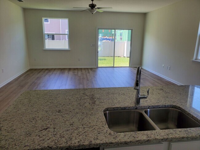 Building Photo - 3 Bed 2.5 Bath with Garage in the newly de...