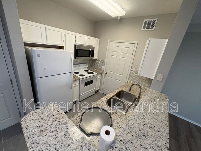 Building Photo - 1571 Spring Gate Dr.