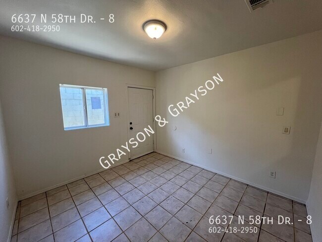 Building Photo - 6637 N 58th Dr
