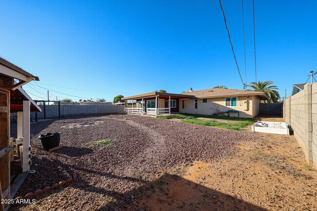 Building Photo - 6539 E Arbor Ave