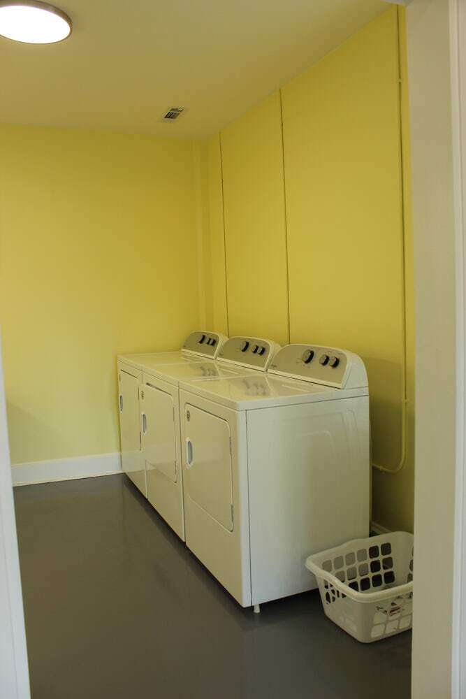 The laundry room includes 3 washers and 3 dryers. - 3813 Gallatin Pike