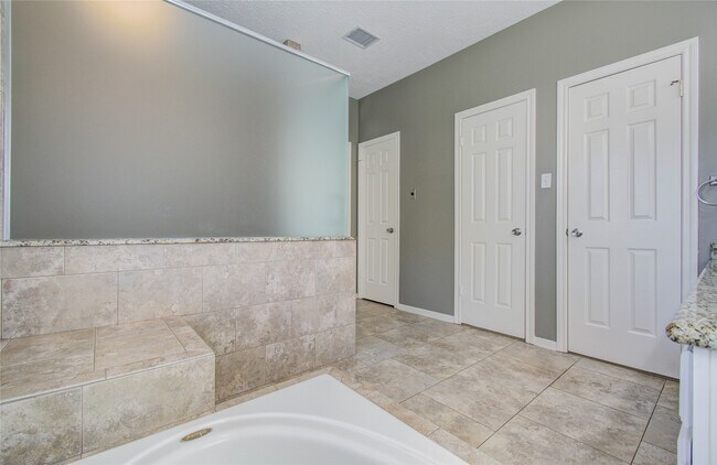 Building Photo - 14806 Flowerwood Dr