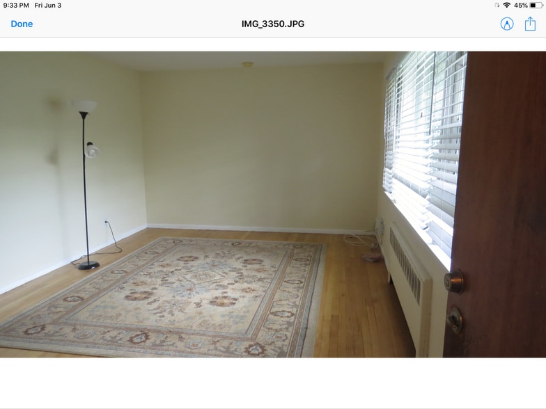 Living room with picture window - 612 4th Ave