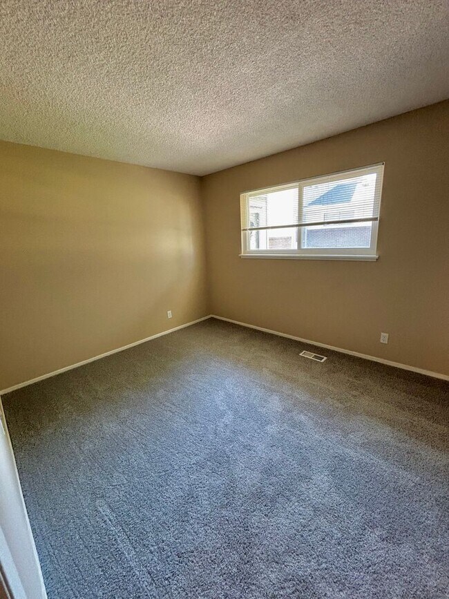 Building Photo - Live in Style! Updated Denver 2-Bedroom Townhome with Modern Design & Large 1-Car Garage!!