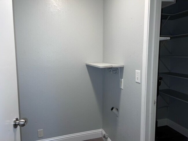 Building Photo - Laminate flooring throughout. Solar panels...