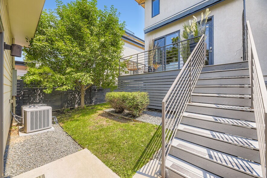 this fully fenced yard extends around the corner to a large side yard space - 2765 S Sherman St