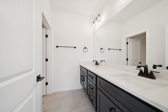 Building Photo - Welcome to this stunning new build in the desirable gated community of Broken Arrow, OK!