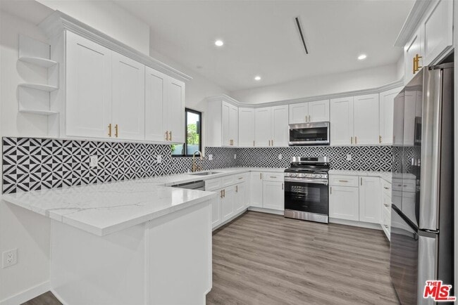 Building Photo - 6245 McLaren Ave