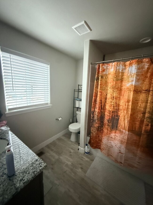 Building Photo - Like-New 4BR Home with EV Charging & Designer Upgrades