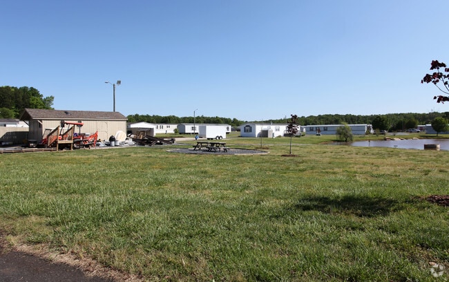 Building Photo - North Meadows Manufactured Home Community