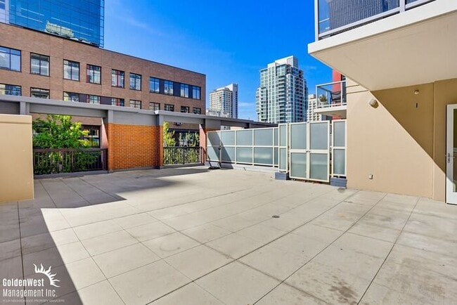 Building Photo - Immaculate 1Bdm 1Ba Condo with Massive Private Patio in the Diamond Terrace Building in Prime Dow...