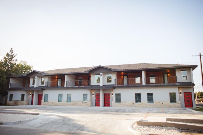 Building Photo - AUGUST MOVE-IN SPECIAL: 4 Private Suites • Walk to Texas Tech • Modern Finishes