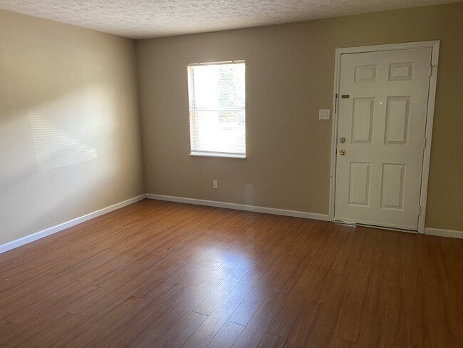 Living room looking at front door - 110 Stonetree Drive