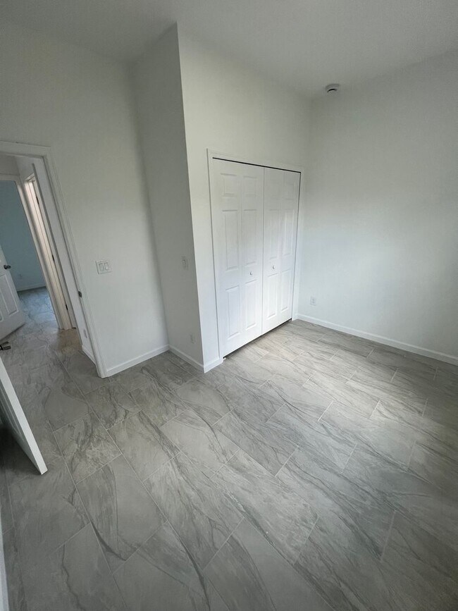 Building Photo - Brand-New 3BR/2BA Home with Garage – Serene Lake Placid Neighborhood