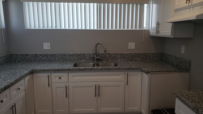 Building Photo - 2057 W Florence Ave