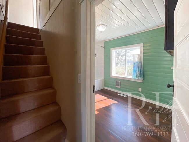 Building Photo - Whimsical Craftsman with Wraparound Porch, Bonus Room & Liberty Bay Peek Views