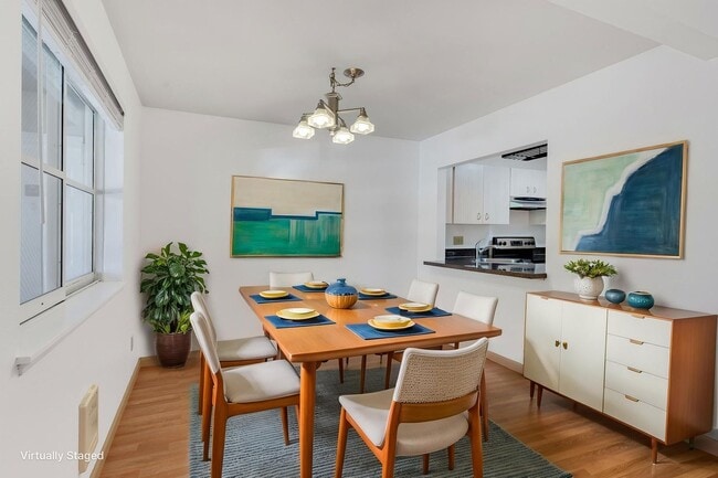 Building Photo - 2 level condo, 3 decks, Stainless Appliances, 2 parking spots, Water, sewer, garbage included!