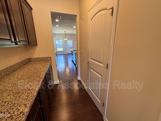 Building Photo - 1009 Magnolia Blossom Ln
