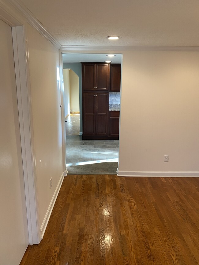 Looking from the Dining room through the Kitchen to the Living room - 415 Wayne Duke Rd