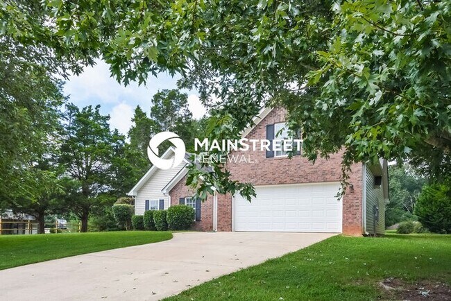 Building Photo - 4 Bedroom Pet-Friendly Home in Covington, GA with Main Street Renewal