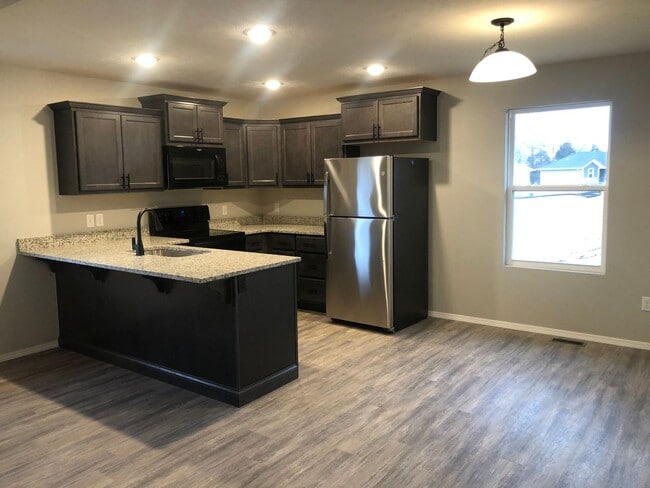 Building Photo - Make this BRAND NEW beautiful modern home ...