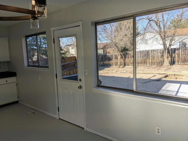 Kitchen view of backyard - 5777 Tuckerman Ln