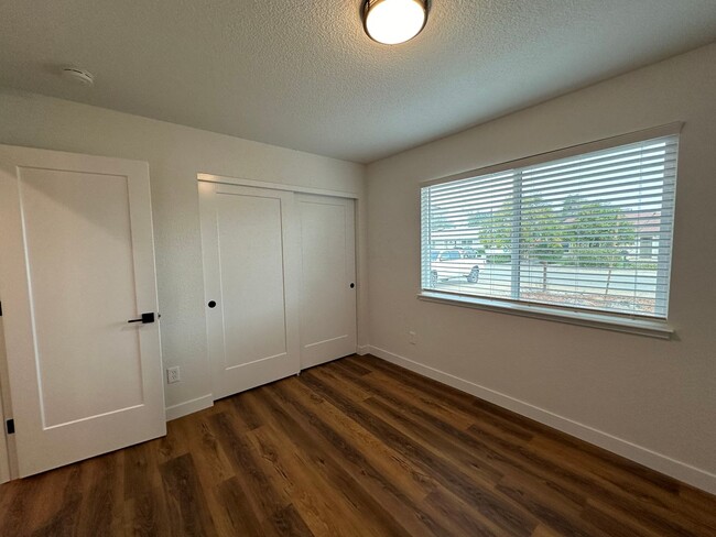 Building Photo - Updated Home with Island Kitchen, LVP Flooring, and Yard Care Included!