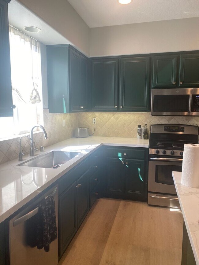 Building Photo - COMING SOON! Spacious 4-Bedroom Townhome w...