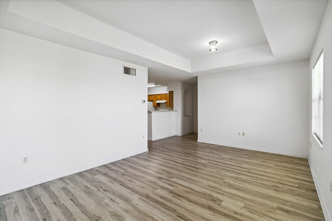 Building Photo - Spacious 1-Bedroom Condo for Annual Rent available now in gated Villagio Community