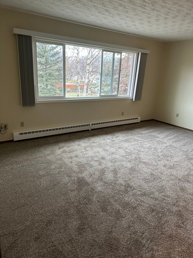 Building Photo - 6511 E 8th Ave